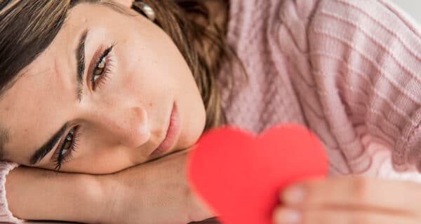 close-up-woman-holding-heart